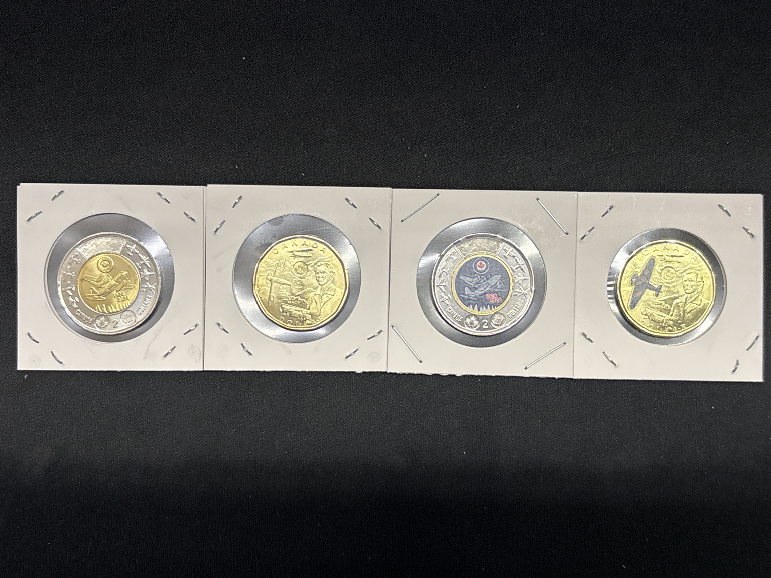 LOT 2026-342 — Lot de 4 pièces commémoratives canadiennes – Thème aviation – UNC / BU — photo 2