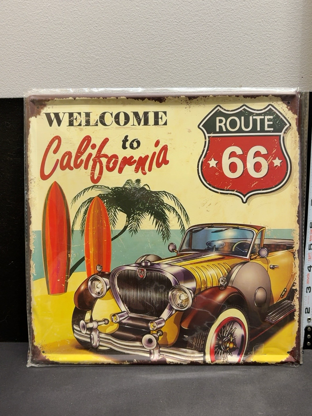LOT 2026-477 — Plaque décorative vintage en métal au thème de la mythique Route 66 et de la… — photo 1