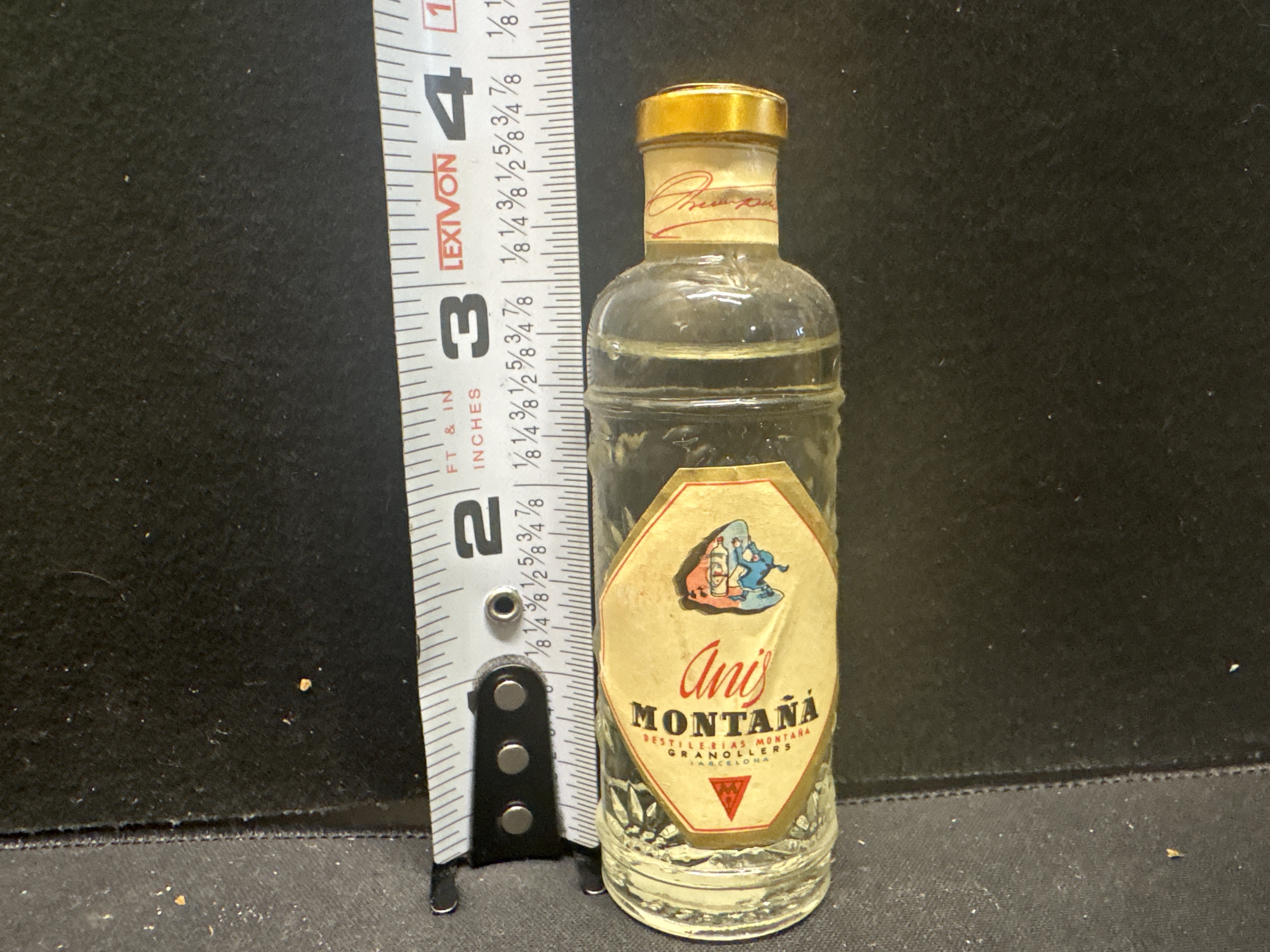 LOT 2026-566 — Bouteille miniature en verre de **Anís Montana**, de **Destilerías Montana… — photo 1