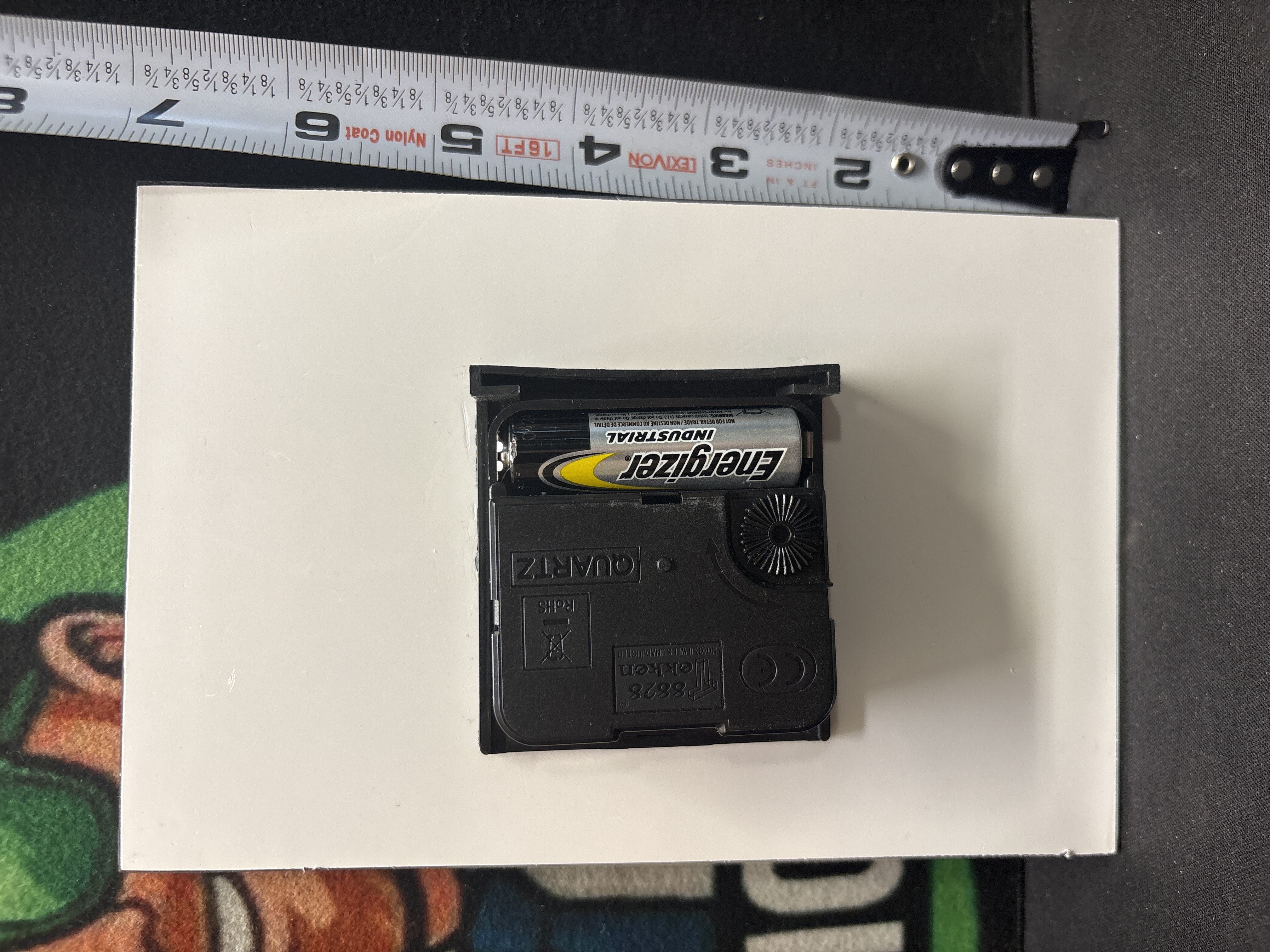 LOT 2026-599 — Horloge décorative murale au design de cassette audio, avec boîtier noir et… — photo 3