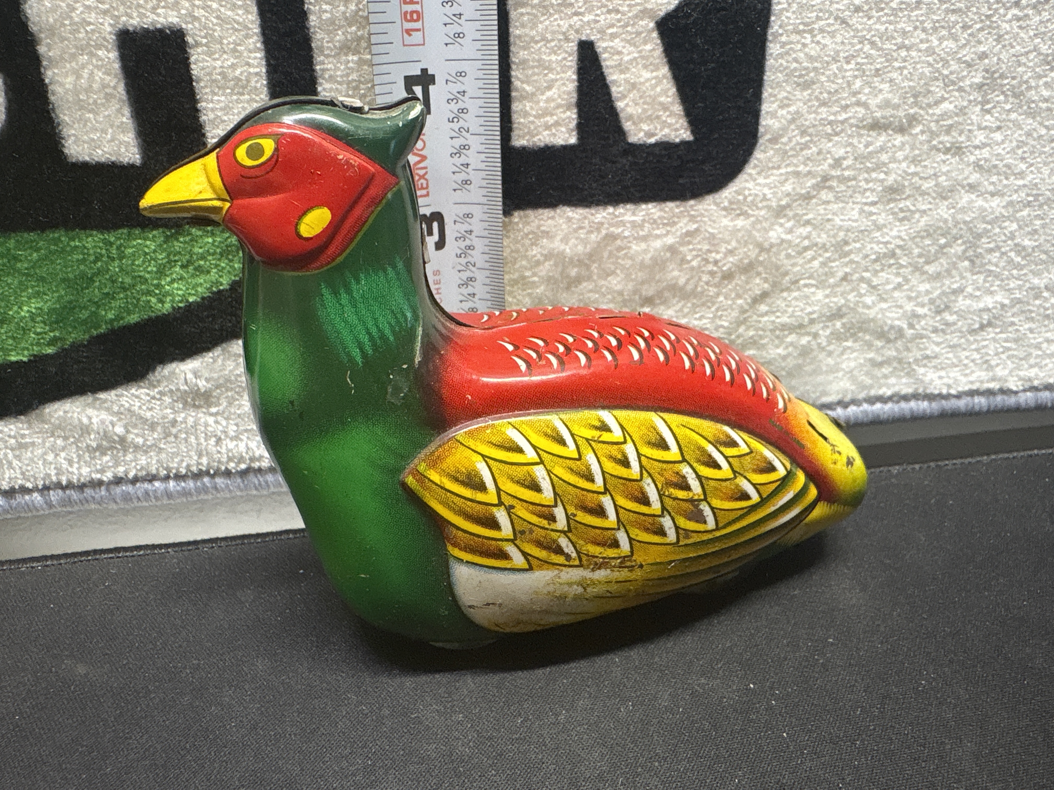 LOT 2026-730 — Joli jouet mécanique en métal lithographié représentant un oiseau aux couleurs… — photo 2
