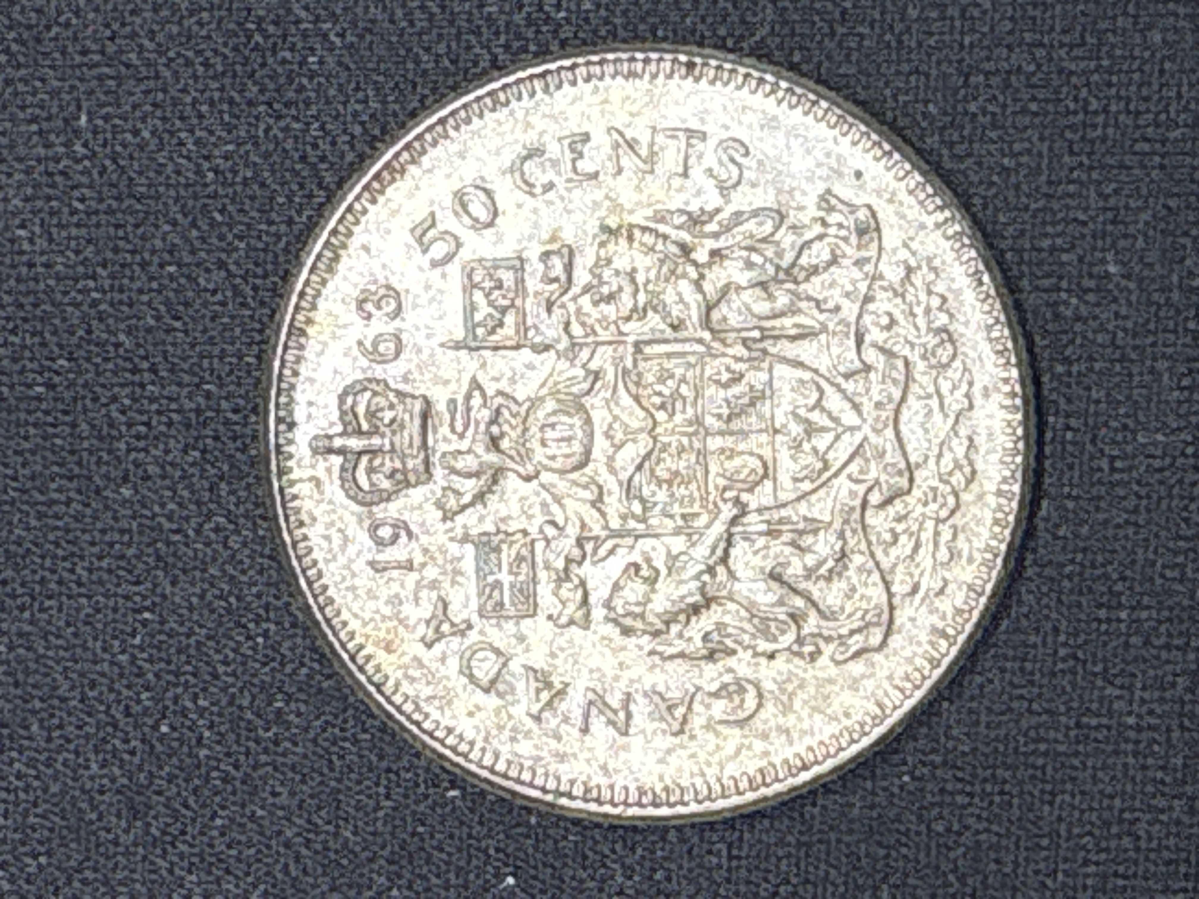 LOT 2026-864 — Pièce de 50 cents canadienne de 1963, à l’effigie de la reine Elizabeth II à… — photo 1