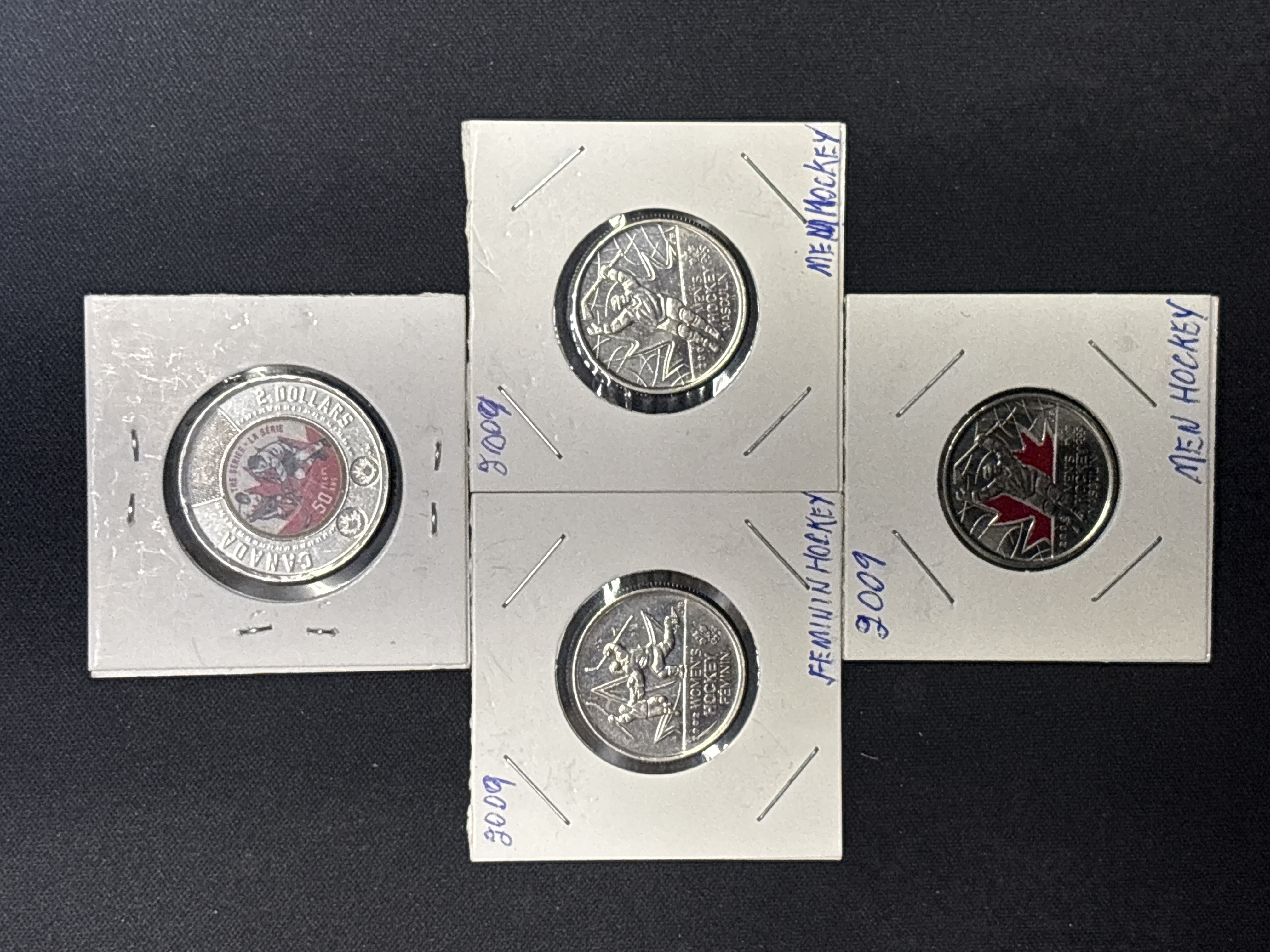 LOT 2026-891 — Ensemble de 4 pièces de monnaie canadiennes présentées dans des cartons de… — photo 1