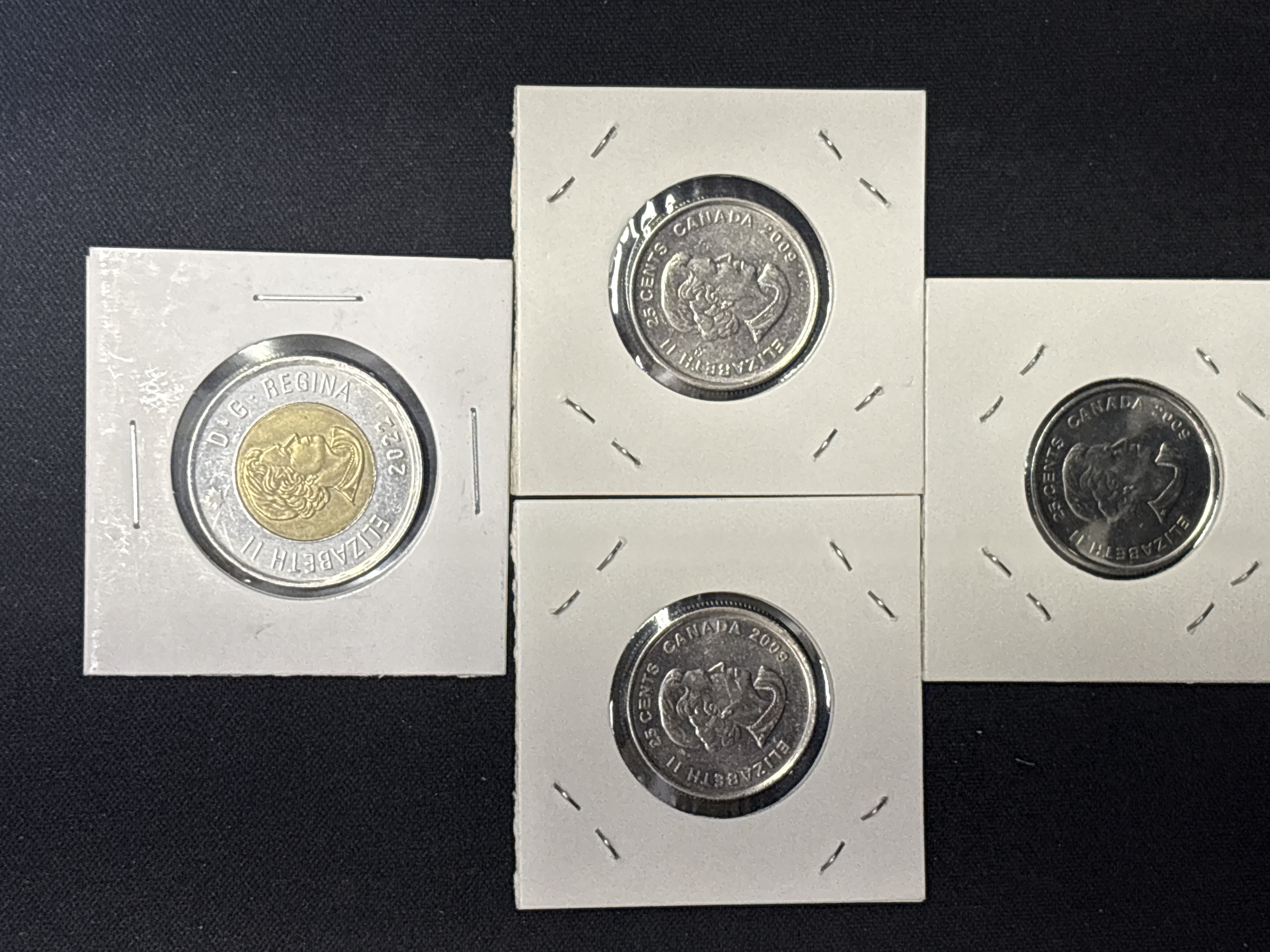LOT 2026-891 — Ensemble de 4 pièces de monnaie canadiennes présentées dans des cartons de… — photo 2