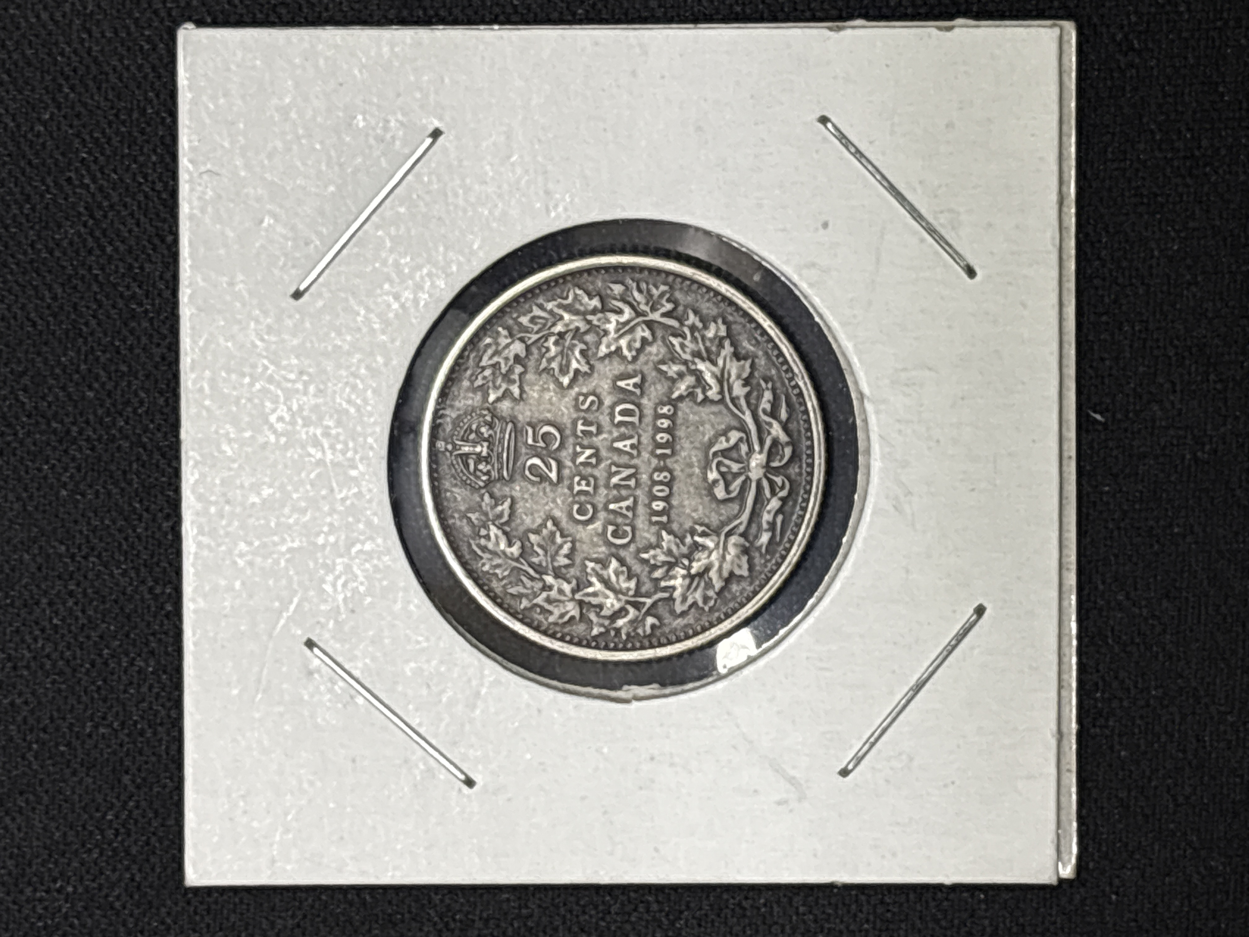 LOT 2026-896 — Pièce de monnaie canadienne en argent de 25 cents, datée 1998, présentée dans… — photo 1
