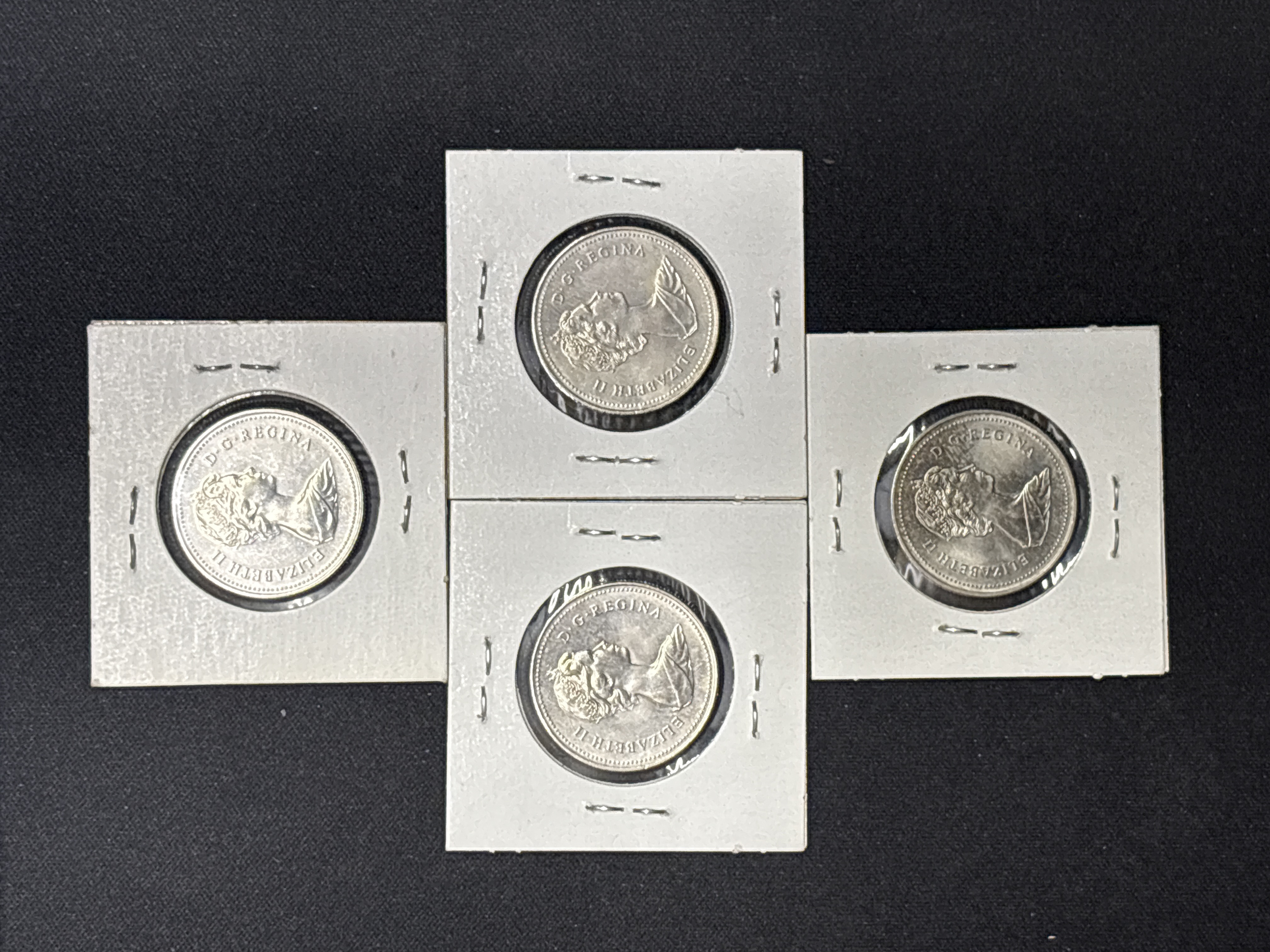 LOT 2026-952 — Ensemble de 4 pièces de monnaie canadiennes de 50 cents à l’effigie… — photo 2